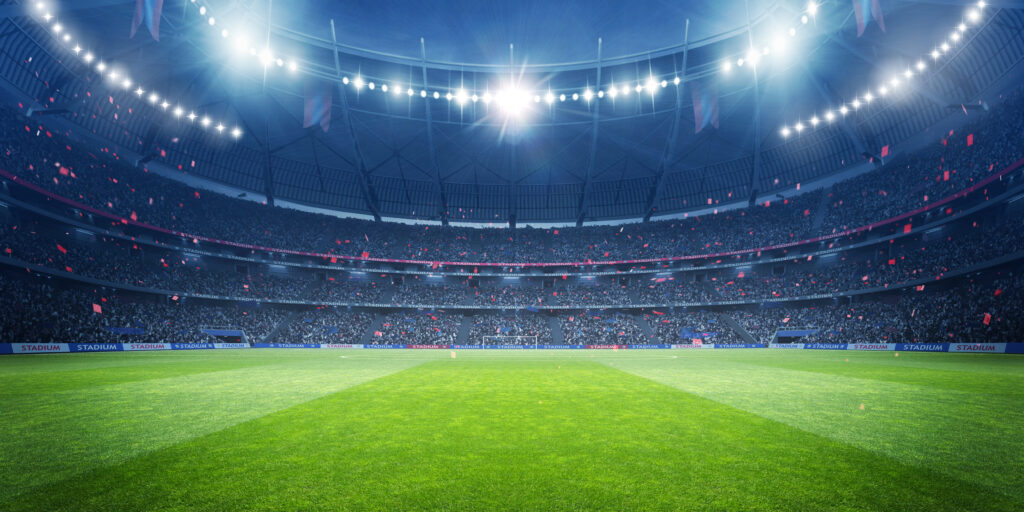 Football stadium at night.