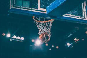 Scoring during a basketball game ball in hoop